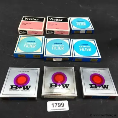 9 fotolenzen in originele dozen – kavel bij ProVeiling