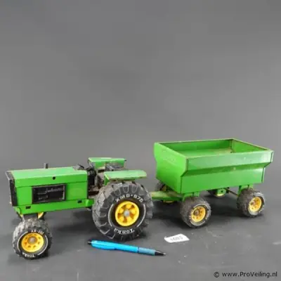 Tonka tractor met aanhanger (modellen XMB-975 en XR-101) – kavel bij ProVeiling