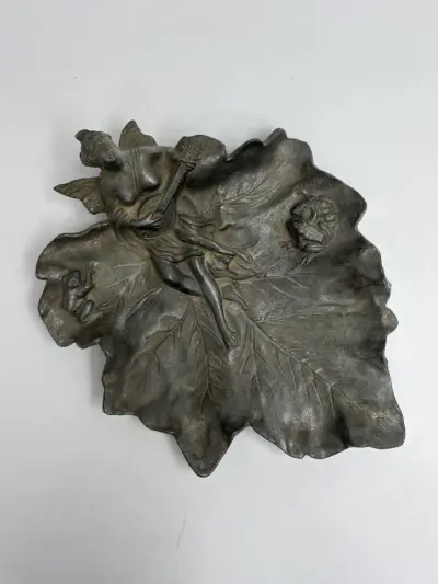 Decoratief metalen blad met engel en luit – kavel bij De Kringwinkel, Gent