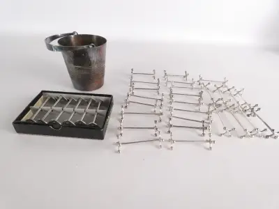 Set van messenleggers en verzilverde ijsemmer – kavel bij De Kringwinkel, Heverlee