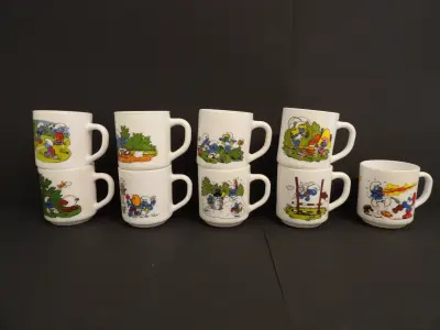 9 Smurfen mokken – kavel bij De Kringwinkel, Leopoldsburg