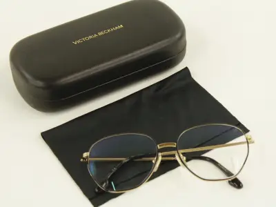 Victoria Beckham goudkleurig montuur – kavel bij De Kringwinkel, Antwerpen