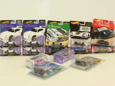 Hot Wheels "Silhouettes/mschf/treasure hunts" en "Tarmac works hobby 64" schaalmodel auto's – kavel bij De Kringwinkel, Antwerpen