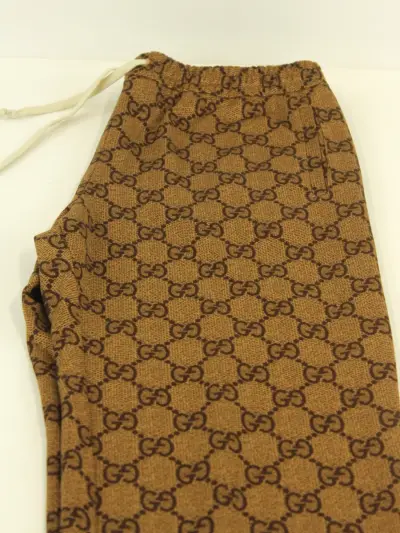 GUCCI joggingbroek met overall GG monogram - Made in Italy - zo goed als nieuw – kavel bij De Kringwinkel, Antwerpen