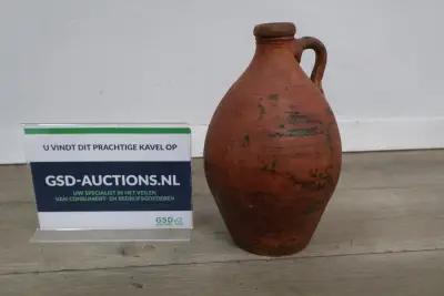 Oude terracotta kruik met handvat – kavel bij GSD Auctions, Zoeterwoude