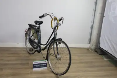 Gazelle damesfiets zwart met bagagedrager en verlichting – kavel bij GSD Auctions, Zoeterwoude