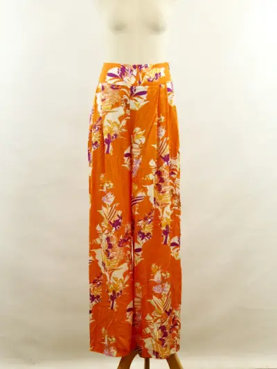 Rae Antwerp elegante soepelvallende oranje damesbroek met bloemenprint – kavel bij De Kringwinkel, Antwerpen