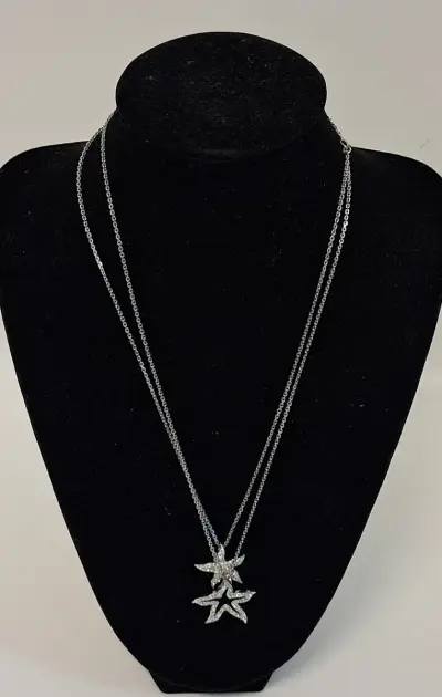 Zilverkleurige ketting met stervormige hanger van Swarovski – kavel bij De Kringwinkel, Aalst
