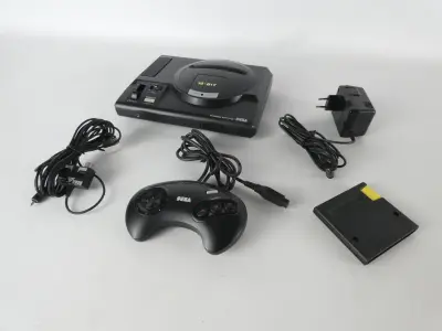 Sega Mega Drive 16-Bit – console met controller, kabels en gamecartridge – kavel bij De Kringwinkel, Heverlee