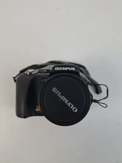 Complete Olympus SP-560UZ Ultra Zoom Camera – 18x Optische Zoom – kavel bij De Kringwinkel, Waardamme