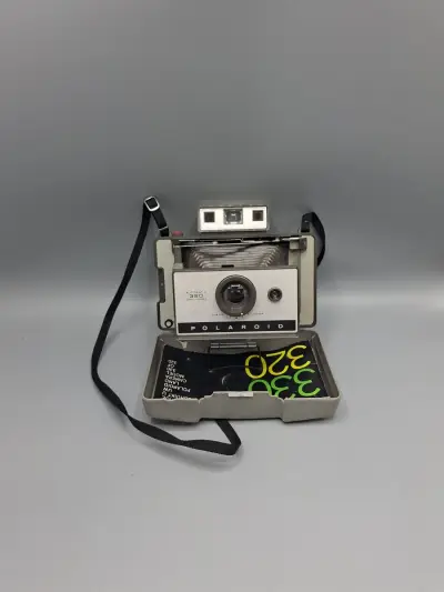 Vintage Polaroid Automatic 320 Land Camera (1969-1971) + Originele Handleiding! – kavel bij De Kringwinkel, Waardamme