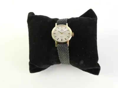 Omega Dameshorloge met gevlochten band – kavel bij De Kringwinkel, Heverlee