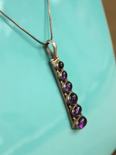 Sterling zilveren slangenketting met amethistenhanger – kavel bij De Kringwinkel, Antwerpen