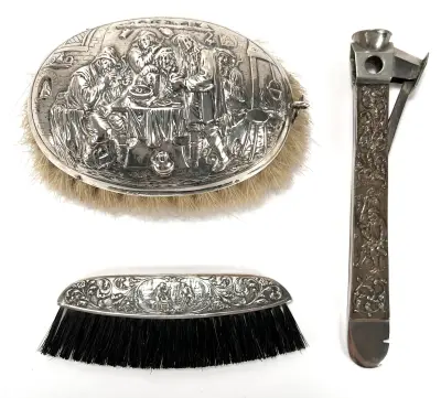 Zilveren kledingborstel, kam en sigarenknipper, ca. 1900 – kavel bij Veilinghuis Klinkhamer, Groningen