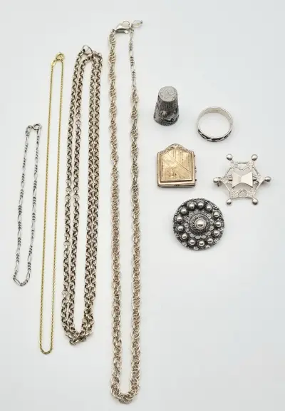 Convoluut sieraden - zilver, doublé en onedel, 20e eeuw – kavel bij Veilinghuis Klinkhamer, Groningen