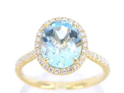 Gouden entourage ring met ovaal geslepen topaas – kavel bij Onlineveilingmeester