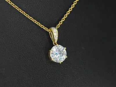 Gouden solitair hanger met een diamant van 1.50 carat, excl. ketting – kavel bij Onlineveilingmeester