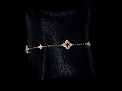 Rosegouden armband in klaver vier vorm met diamanten – kavel bij Onlineveilingmeester