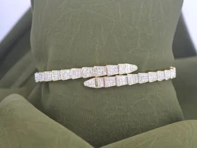 Gouden armband van serpent model met natuurlijke diamanten – kavel bij Onlineveilingmeester