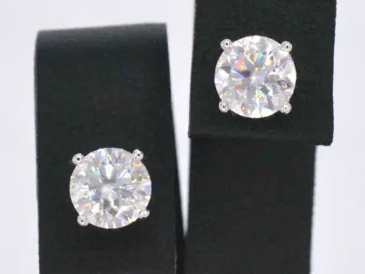 Witgouden solitaire oorbellen met briljanten van 2.00 carat – kavel bij Onlineveilingmeester