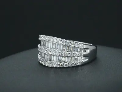 Witgouden ring met briljant en baguettes diamanten – kavel bij Onlineveilingmeester