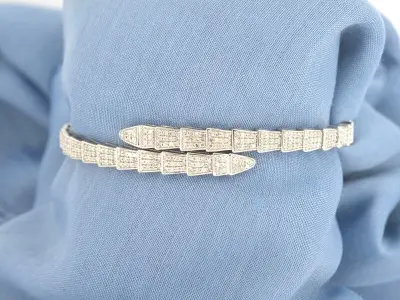 Witgouden armband van serpent model met natuurlijke diamanten – kavel bij Onlineveilingmeester