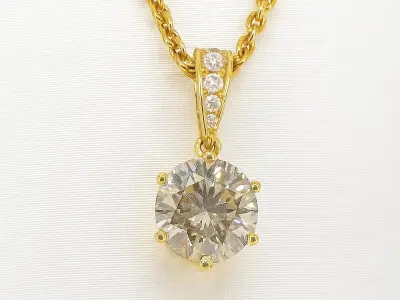 Gouden solitair hanger met een diamant van 1.50 carat, excl. ketting – kavel bij Onlineveilingmeester