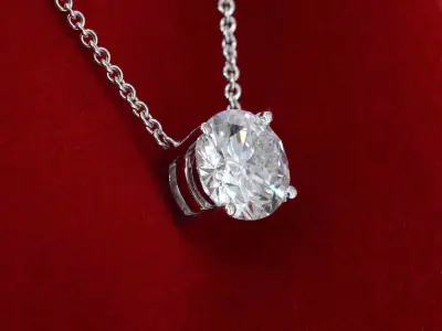 Witgouden halsketting met een diamant van 0.70 carat – kavel bij Onlineveilingmeester