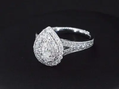 Witgouden druppelvormige entourage ring met diamanten – kavel bij Onlineveilingmeester