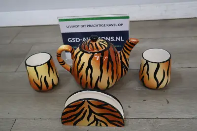 Theeset met tijgerprint servies – kavel bij GSD Auctions, Zoeterwoude