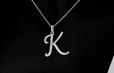 Hanger met echte natuurlijke diamanten in de letter K, excl. ketting – kavel bij Onlineveilingmeester
