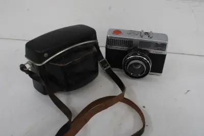 Vintage Optima 200 camera met leren draagtas – kavel bij GSD Auctions, Zoeterwoude