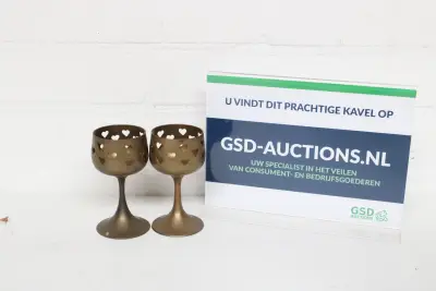 Set van twee metalen kandelaars met hartmotief – kavel bij GSD Auctions, Zoeterwoude