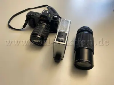 1 Canon T50 Spiegelreflexkamera - analog – kavel bij Zoll-Auktion, Herford