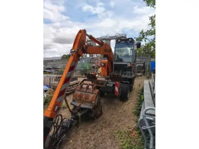 1 BOKI 6552 Mobilbagger - fahrbereit – kavel bij Zoll-Auktion, Eschweiler