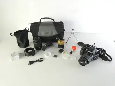 Nikon D3100 spiegelreflexcamera met accessoires en tas – kavel bij De Kringwinkel, Heverlee