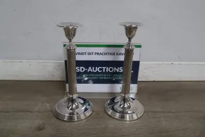 Set zilverkleurige kandelaars – kavel bij GSD Auctions, Zoeterwoude