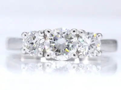 Witgouden trinity ring met briljant geslepen diamanten – kavel bij Onlineveilingmeester
