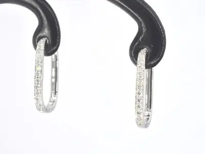 Witgouden oorbellen met diamant – kavel bij Onlineveilingmeester