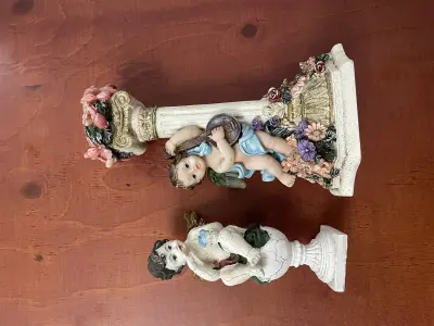 Kandelaar met engeltjes en een beeld van angel – kavel bij GSD Auctions, Zoeterwoude