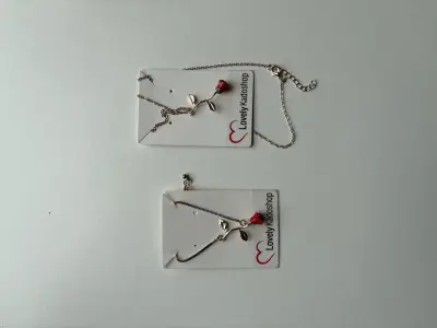 Roos ketting en armband goudkleurig – kavel bij GSD Auctions, Zoeterwoude