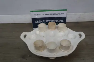 Porseleinen eierdopjeshouder met eierdoppen – kavel bij GSD Auctions, Zoeterwoude