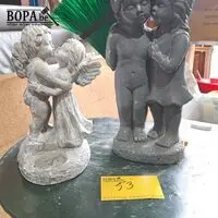 Tuinbeelden liefdeskoppeltes - 2 stuks – kavel bij BOPA Auctions, Aarsele