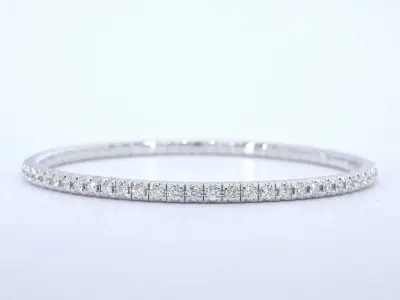 Witgouden armband met briljant geslepen diamanten en een onzichtbare sluiting – kavel bij Onlineveilingmeester
