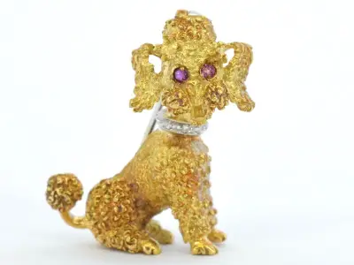 Gouden poedel broche – kavel bij Onlineveilingmeester