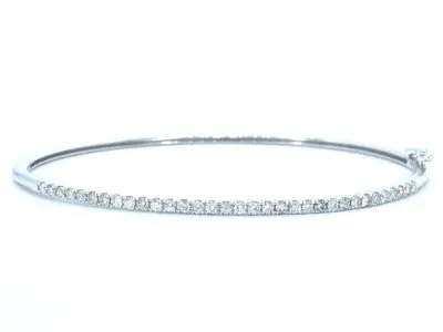 Witgouden bangle armband met natuurlijke briljant geslepen diamanten – kavel bij Onlineveilingmeester