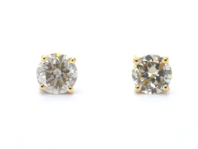 Gouden solitair oorbellen met natuurlijke briljant geslepen diamanten – kavel bij Onlineveilingmeester