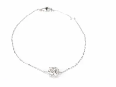 Witgouden armband met een diamanten bedel – kavel bij Onlineveilingmeester