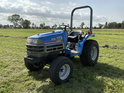 Iseki Sial TF173F vierwielaangedreven minitractor met grondfrees – kavel bij Dome Auctions, Middelkerke