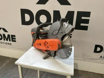 Husqvarna K970 Doorslijpmachine/betonzager – kavel bij Dome Auctions, Depot Deinze